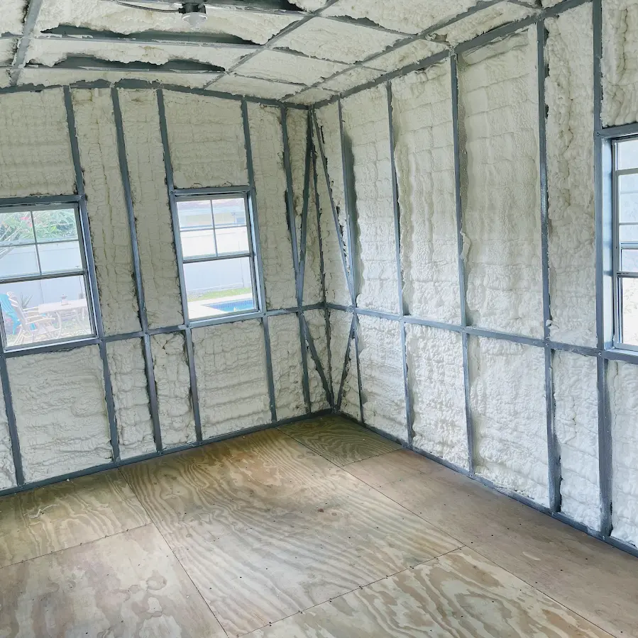 Closed-cell spray foam insulation applied to wall cavities in a residential project in Pemberton