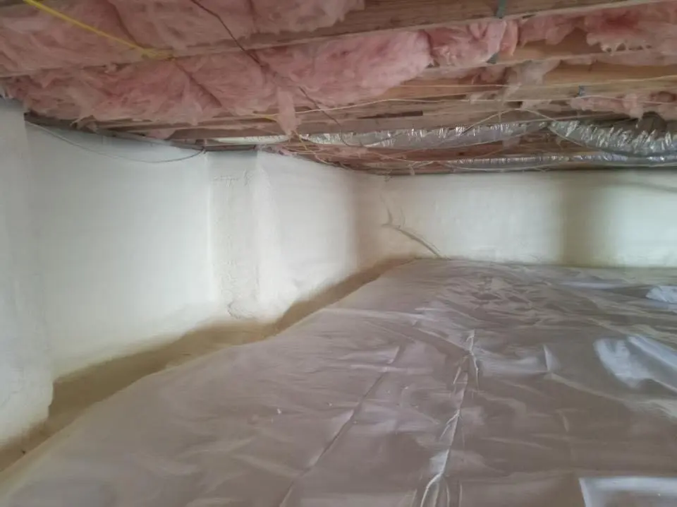 Crawl space encapsulation with closed-cell spray foam for Commercial Roof Restoration in Pemberton